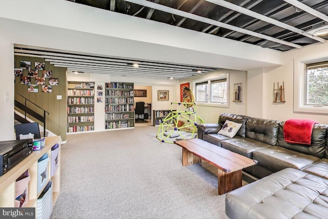 living room featuring carpet flooring and plenty of natural light