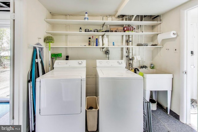 laundry room featuring laundry area and separate washer and dryer