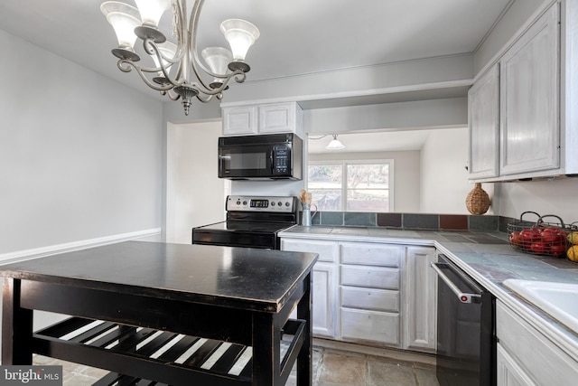 kitchen featuring dishwashing machine, electric range, tile counters, white cabinets, and black microwave