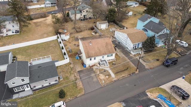 birds eye view of property with a residential view