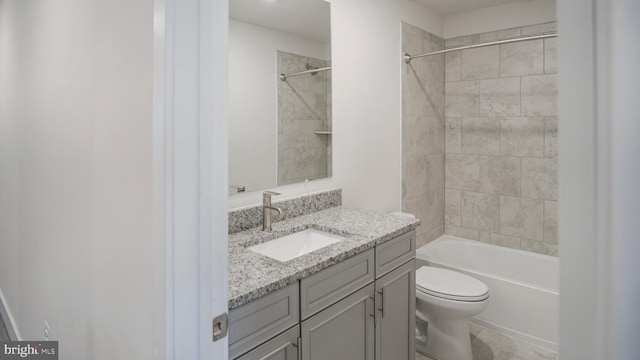 full bathroom with toilet, shower / bathing tub combination, and vanity