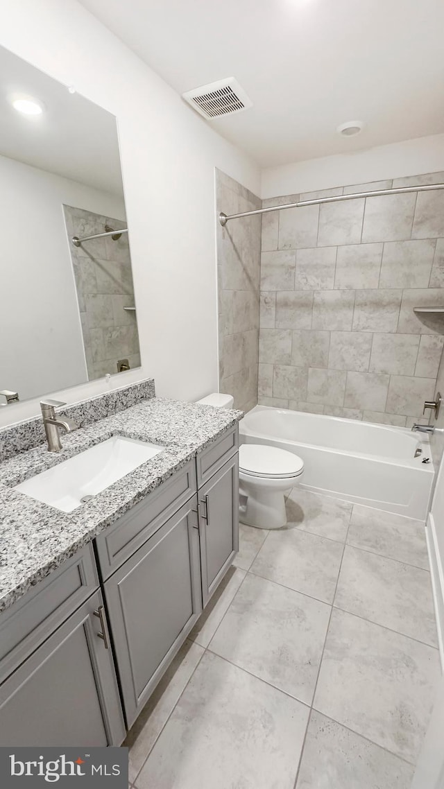 full bathroom with toilet, shower / bathing tub combination, vanity, and visible vents