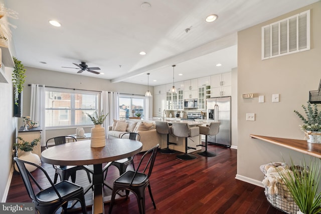 dining area with baseboards, visible vents, recessed lighting, ceiling fan, and dark wood-type flooring