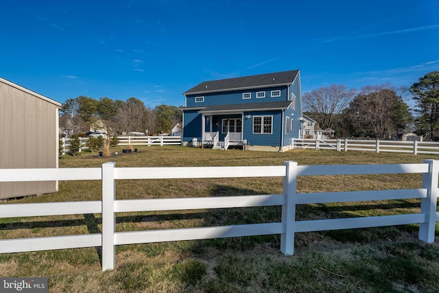 view of front of property featuring fence