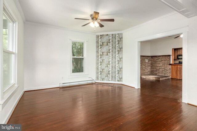201 Washington St, Cambridge, MD 21613 - unfurnished room featuring a ceiling fan, wood-type flooring, a baseboard radiator, and ornamental molding
