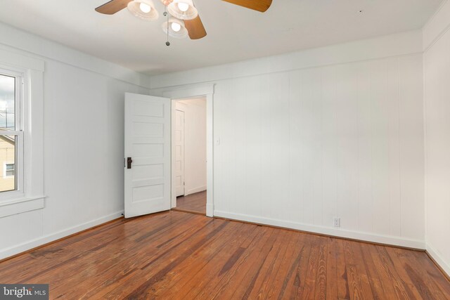 201 Washington St, Cambridge, MD 21613 - spare room featuring a ceiling fan and wood-type flooring