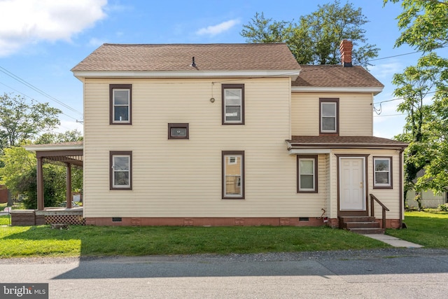 201 Washington St, Cambridge, MD 21613 - view of front of property featuring entry steps, crawl space, a chimney, and a front lawn