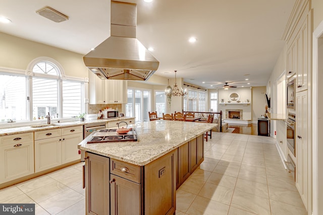 2 Wilderness Dr, Medford, NJ 08055 - kitchen with a center island, stainless steel appliances, island exhaust hood, light tile patterned floors, and visible vents