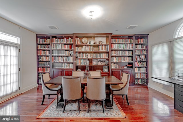 2 Wilderness Dr, Medford, NJ 08055 - dining space featuring built in features, baseboards, wood finished floors, and visible vents