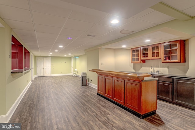 2 Wilderness Dr, Medford, NJ 08055 - kitchen with glass insert cabinets, baseboards, recessed lighting, a sink, and dark wood finished floors