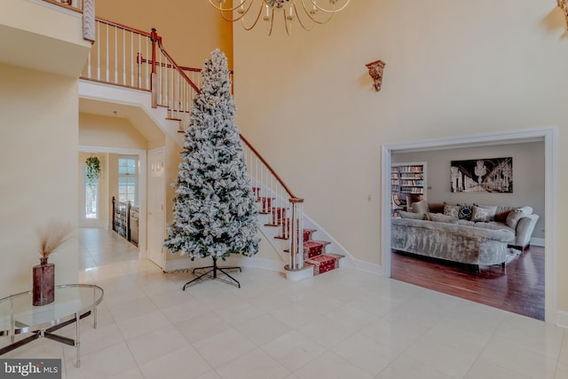 2 Wilderness Dr, Medford, NJ 08055 - entryway featuring a high ceiling, a notable chandelier, tile patterned floors, and stairway
