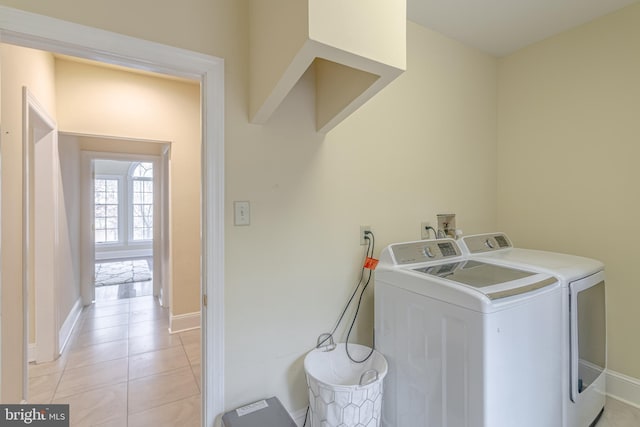 2 Wilderness Dr, Medford, NJ 08055 - laundry room with baseboards, laundry area, light tile patterned flooring, and washing machine and clothes dryer