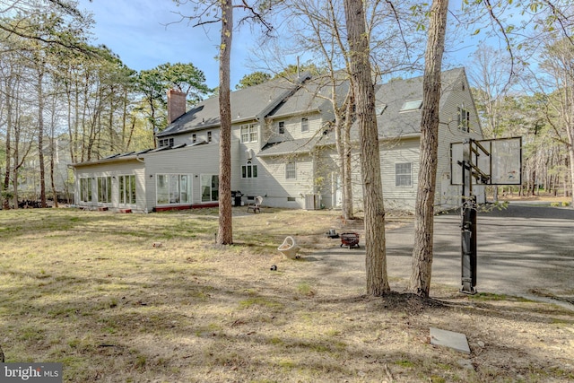 2 Wilderness Dr, Medford, NJ 08055 - exterior space with a shingled roof, a chimney, central AC, and a deck