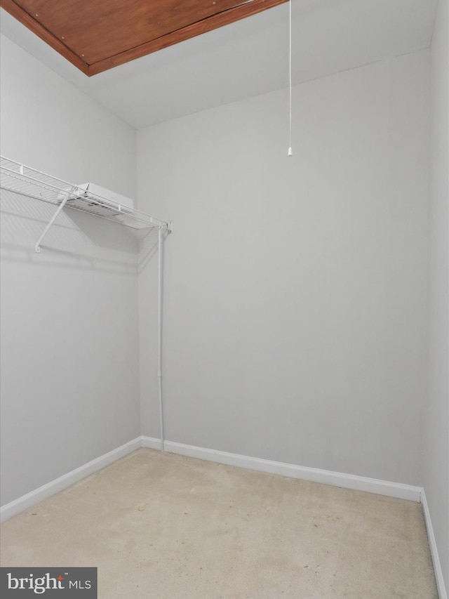 spacious closet with attic access