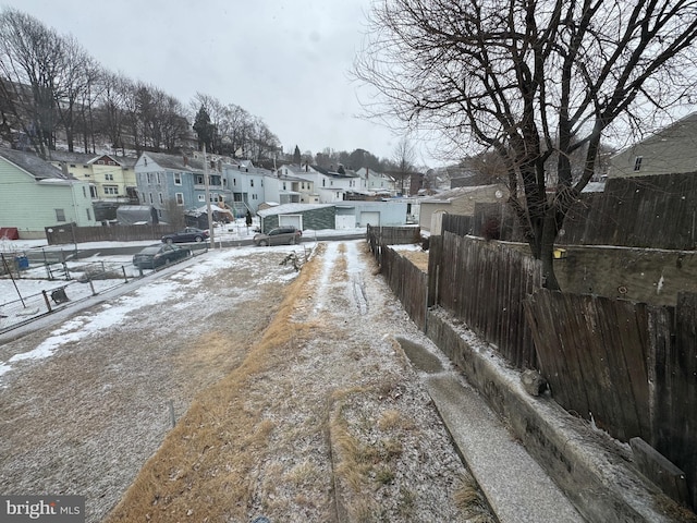 view of road with a residential view