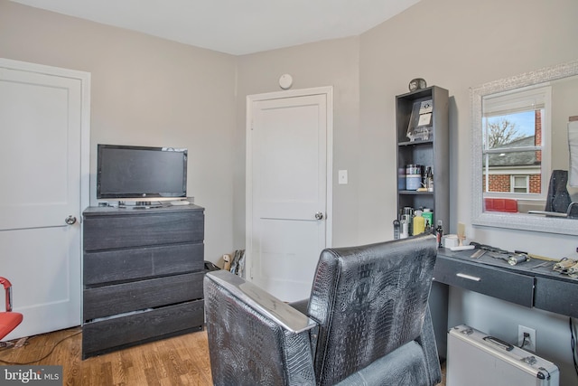 office area with wood finished floors