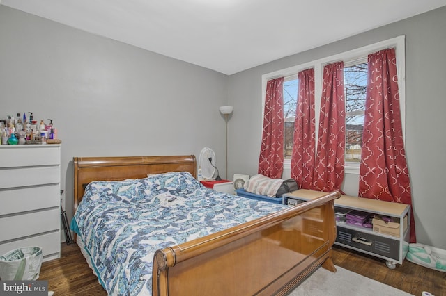 bedroom with wood finished floors