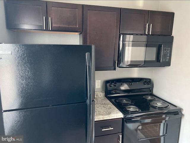 kitchen with dark brown cabinetry and black appliances