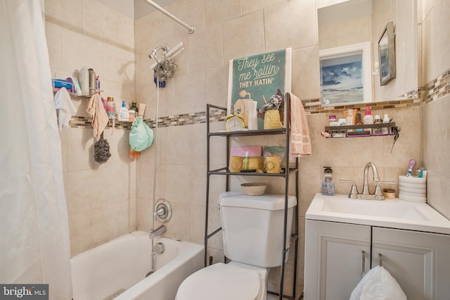 bathroom with toilet, a sink, tile walls, tasteful backsplash, and shower / bathtub combination with curtain