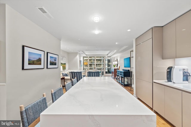 dining area featuring light wood-style flooring, visible vents, and recessed lighting