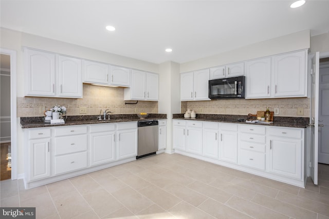 kitchen with backsplash, black microwave, dishwasher, dark stone counters, and white cabinets