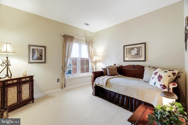 bedroom featuring carpet, visible vents, and baseboards