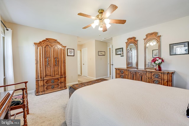 bedroom with baseboards, carpet, and a ceiling fan