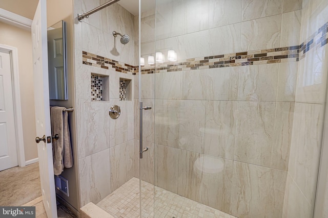 full bathroom featuring a shower stall