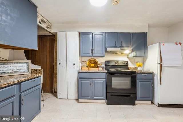 kitchen with blue cabinets, under cabinet range hood, black range with electric stovetop, freestanding refrigerator, and dark stone countertops