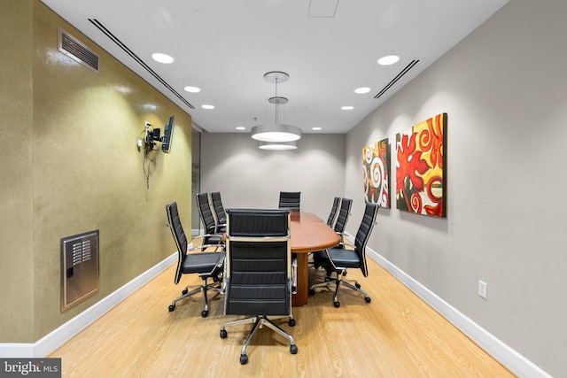 office area with recessed lighting, visible vents, baseboards, and wood finished floors