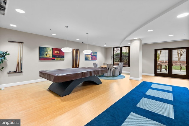 rec room featuring french doors, recessed lighting, visible vents, light wood-type flooring, and baseboards