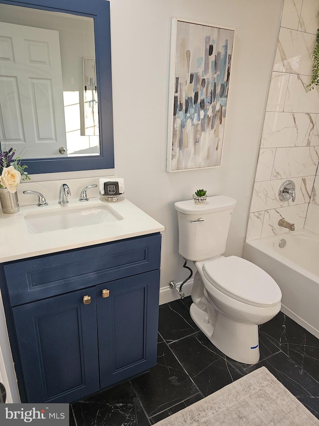 full bath with marble finish floor, shower / tub combination, vanity, and toilet