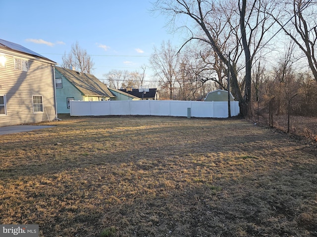 view of yard with fence