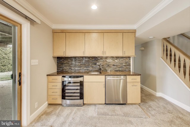 bar featuring wine cooler, stairway, stainless steel dishwasher, ornamental molding, and a sink