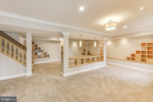 finished below grade area with recessed lighting, carpet floors, baseboards, stairs, and crown molding