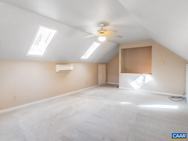 bonus room featuring vaulted ceiling, a wall mounted AC, light colored carpet, and baseboards