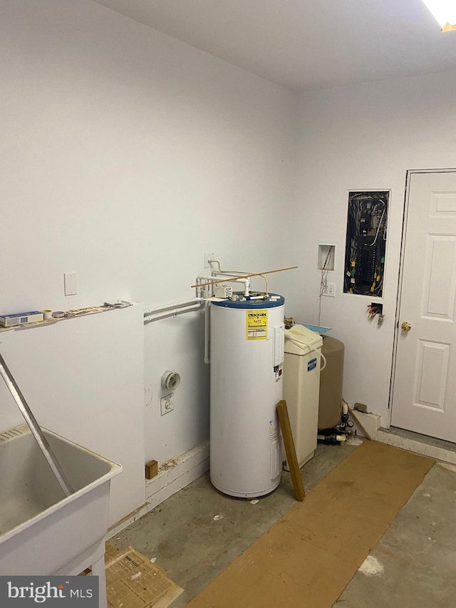 utility room with electric water heater