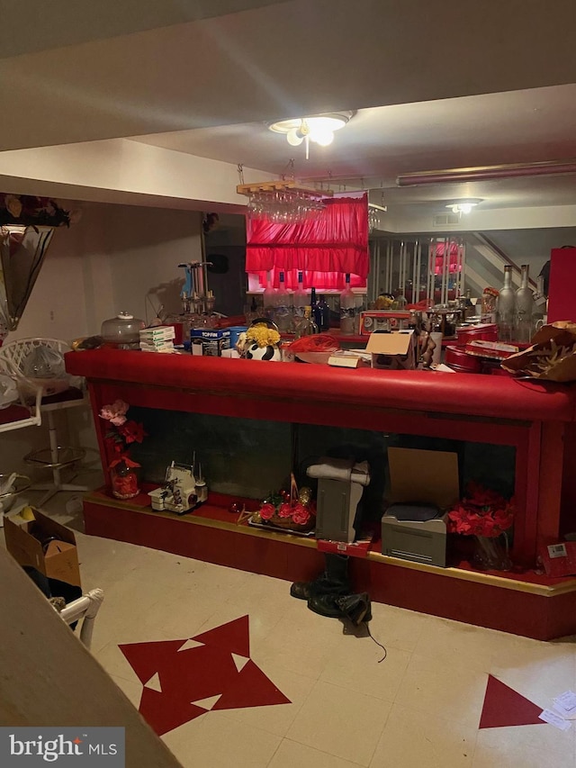 miscellaneous room featuring tile patterned floors