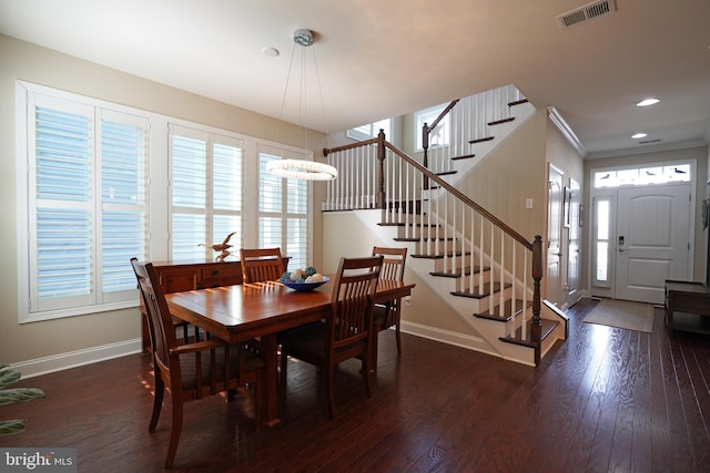 dining room featuring stairway, baseboards, visible vents, and dark wood-style flooring