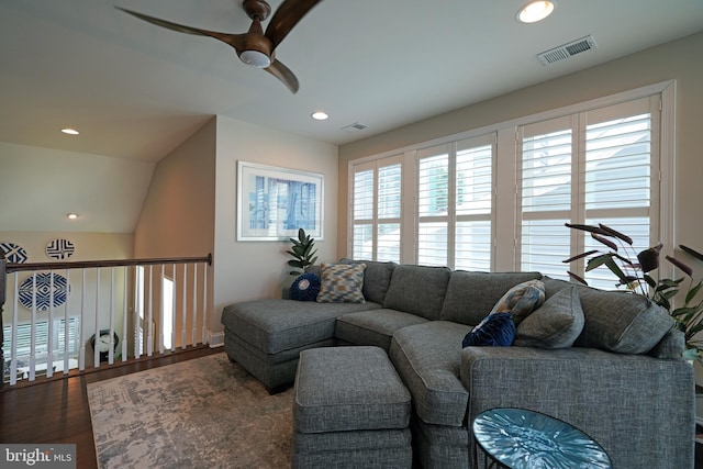 living area with recessed lighting, visible vents, ceiling fan, and wood finished floors