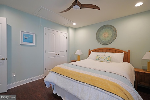 bedroom with recessed lighting, dark wood-style flooring, baseboards, a closet, and attic access