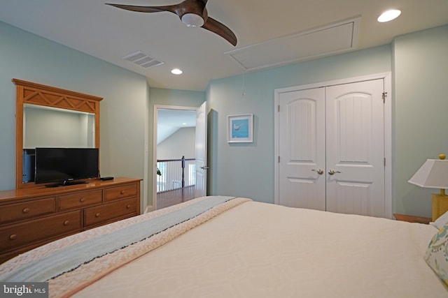 bedroom featuring ceiling fan, recessed lighting, visible vents, a closet, and attic access