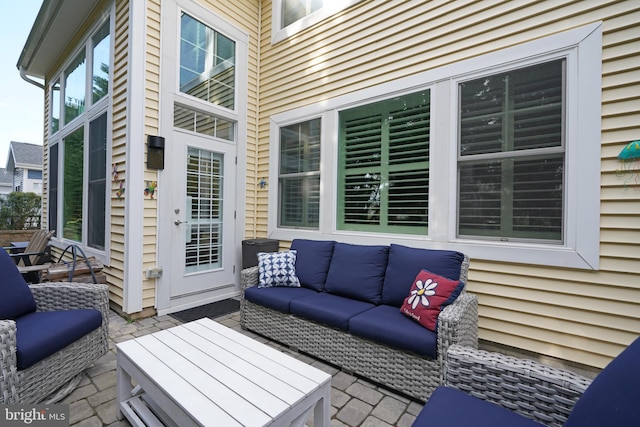 exterior space with outdoor lounge area and a patio