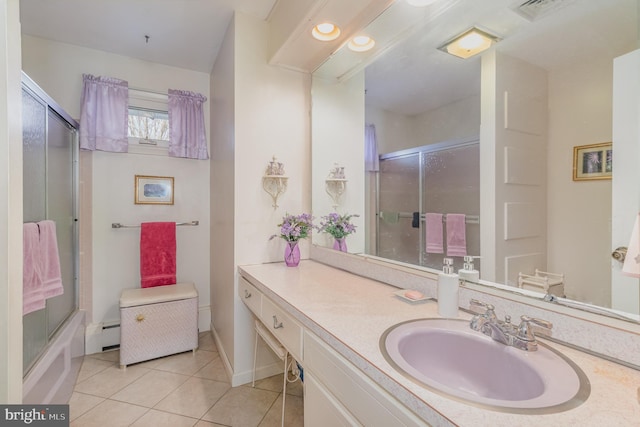 full bathroom with visible vents, shower / bath combination with glass door, a baseboard radiator, tile patterned flooring, and vanity