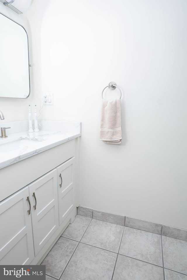 bathroom with vanity and tile patterned floors