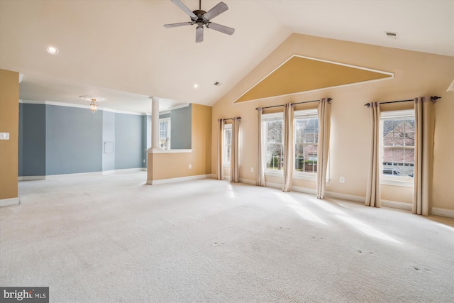 carpeted empty room featuring a ceiling fan, visible vents, vaulted ceiling, and baseboards