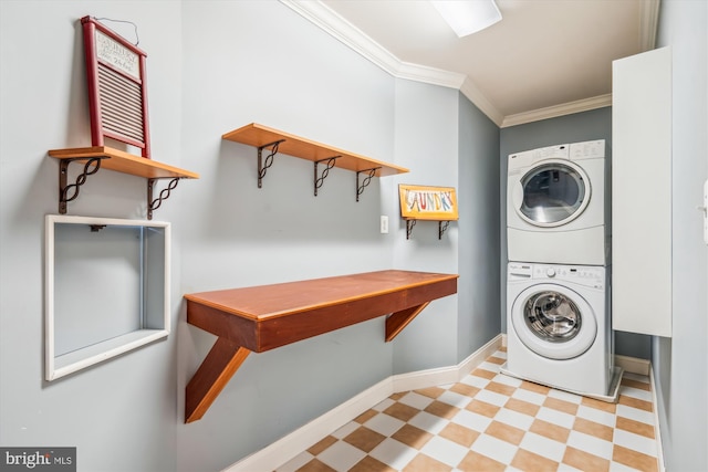 clothes washing area with light floors, stacked washer / drying machine, ornamental molding, laundry area, and baseboards