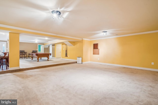 rec room with pool table, ornamental molding, carpet, and baseboards