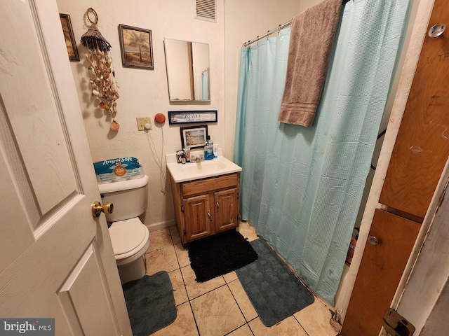 54 E College Ave, Frostburg, MD 21532 - full bathroom with baseboards, visible vents, toilet, tile patterned floors, and vanity