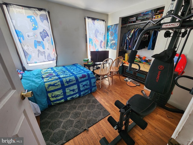 54 E College Ave, Frostburg, MD 21532 - bedroom featuring a closet and wood finished floors